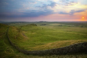 Images Dated 2nd June 2008: ENGLAND Northumberland Hadrians Wall Sunset behind the world heritage site of Hadrians Wall near