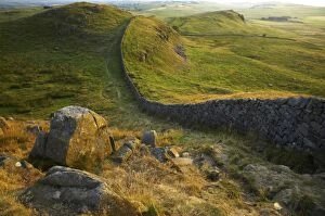 Summer Gallery: ENGLAND Northumberland Hadrians Wall Sunset behind the world heritage site of Hadrians Wall near the town of