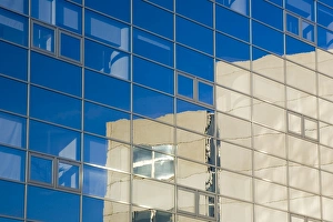 England, Tyne and Wear, Newcastle Upon Tyne. Present day building structures reflected in the windows of an office block in Newcastle