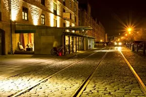 Night Gallery: Scotland, Edinburgh, Leith. Cobbled pedestrian walkway on the Leith Commercial Quay