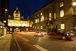 Edinburgh Illuminated Book Gallery: Scotland, Edinburgh, Old Town. A city taxi waiting in traffic on Bank Street