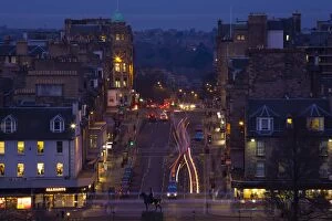 Night Gallery: Scotland, Edinburgh, Princes Street. Royal Scots Greys monument located on the junction of Princes