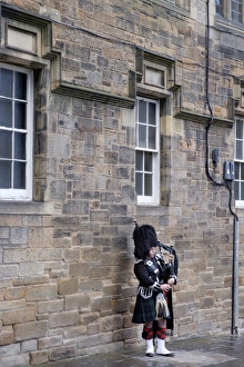 <b class=qtipBold><figcaption>Scotland, Edinburgh, The Royal Mile</figcaption></b><br>Scotland, Edinburgh, The Royal Mile. Bagpipe player (street performer) playing bag pipes along the Royal Mile in Edinburgh.<br><em>© Copyright Jason Friend - All Rights Reserved</em> Scotland, Edinburgh, The Royal Mile