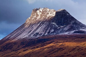 Scotland, Scottish Highlands, Assynt. Stac Pollaidh (also know as Stack Polly ) is an impressive mountain found in the Assynt area, located north of Ullapool. Despite its dramatic appearance, it is only 613 metres (2009 feet)