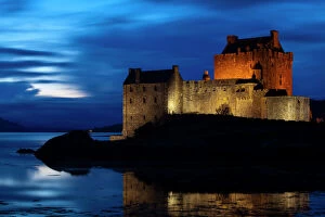 Trending: Scotland, Scottish Highlands, Eilean Donan Castle. Eilean Donan Castle reflected in the still