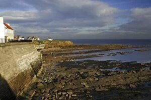Tyne Book Collection: A sea wall built to defend the North Tyneside village of Cullercoats from the forces of the North