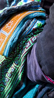Vietnam Gallery: Vietnam, Northern Vietnam, Sapa. Hill tribe clothing and blankets hanging over the arm of a hill